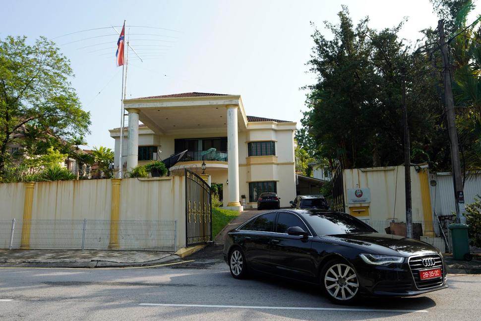 A car goes out of the North Korean Embassy in Kuala Lumpur, Malaysia, Friday, March 19, 2021. North Korea on Friday said it was cutting diplomatic ties with Malaysia to protest a recent court ruling that allows a North Korean citizen to be extradited to the United States to face money laundering charges. (AP Photo/Vincent Thian) The Associated Press